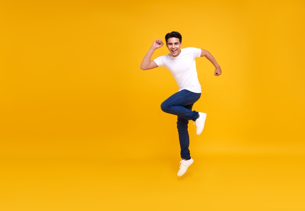 young-handsome-asian-man-smiling-jumping-while-celebrating-success-isolated-yellow_74952-948